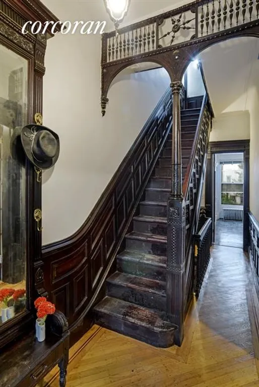 New York City Real Estate | View 477 Decatur Street | Pier mirror, spindles and wainscoting! | View 2