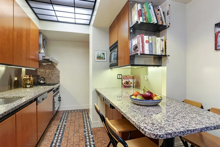 New York City Real Estate | View 333 West End Avenue, 10B | Eat-in chef's kitchen with washer and dryer | View 5