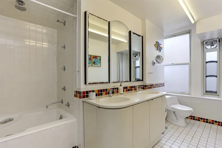 New York City Real Estate | View 333 West End Avenue, 10B | Master bathroom with double vanity and window | View 7