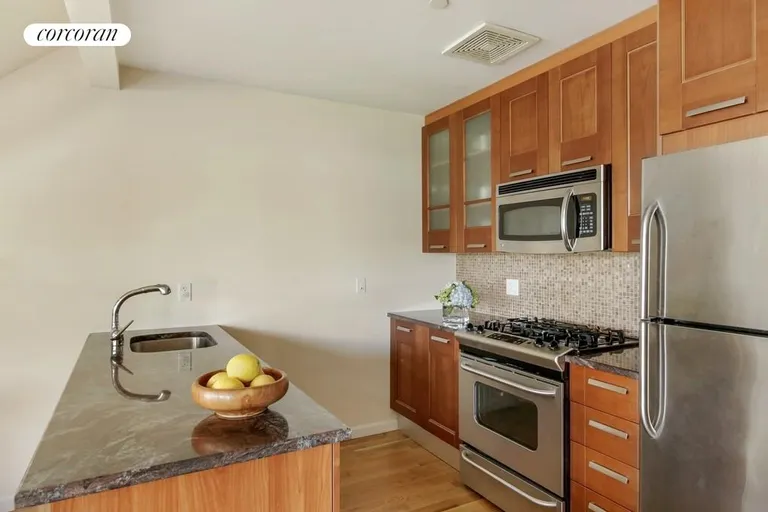 New York City Real Estate | View 372 12th Street, 5 | Chef's Kitchen with Stainless Appliances | View 3