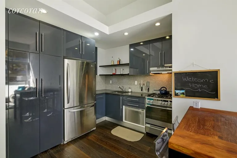 New York City Real Estate | View 390 Lorimer Street, 1A | Open kitchen with Fisher Paykel appliances | View 3