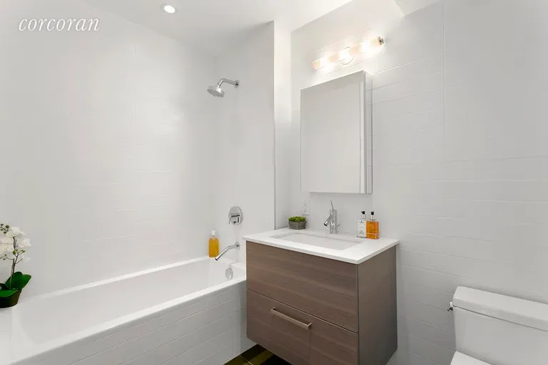 New York City Real Estate | View 701 Union Street, 2A | Modern Bathroom with Deep Soaking Tub | View 4