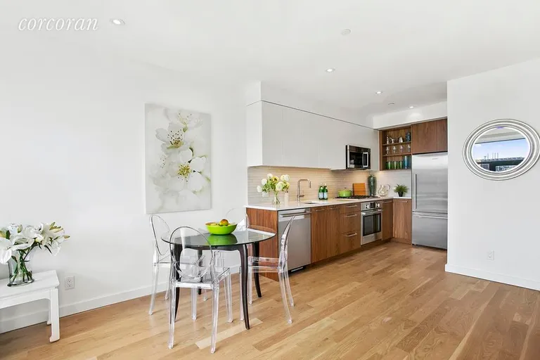 New York City Real Estate | View 701 Union Street, 2A | Kitchen w/ Walnut Cabinets & Stainless Appliances | View 2