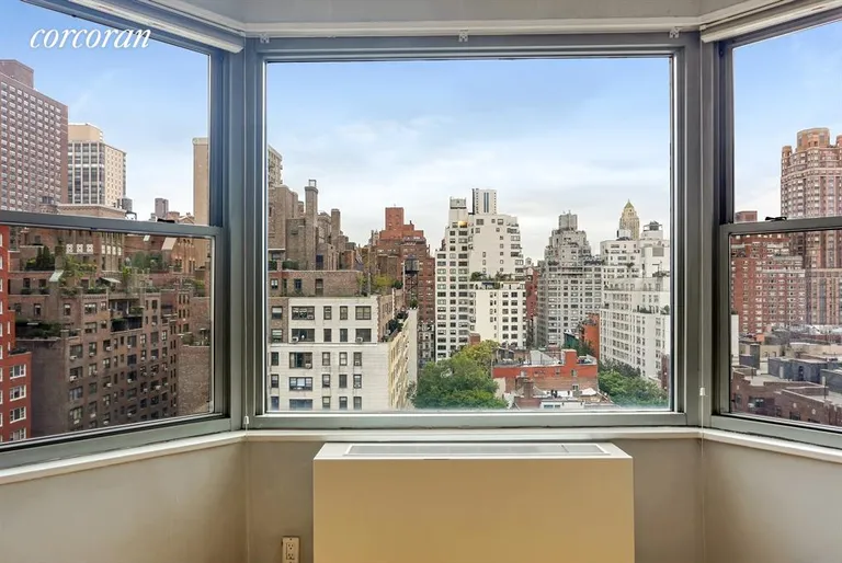 New York City Real Estate | View 300 East 74th Street, 14D | Open Western view through bay window | View 5