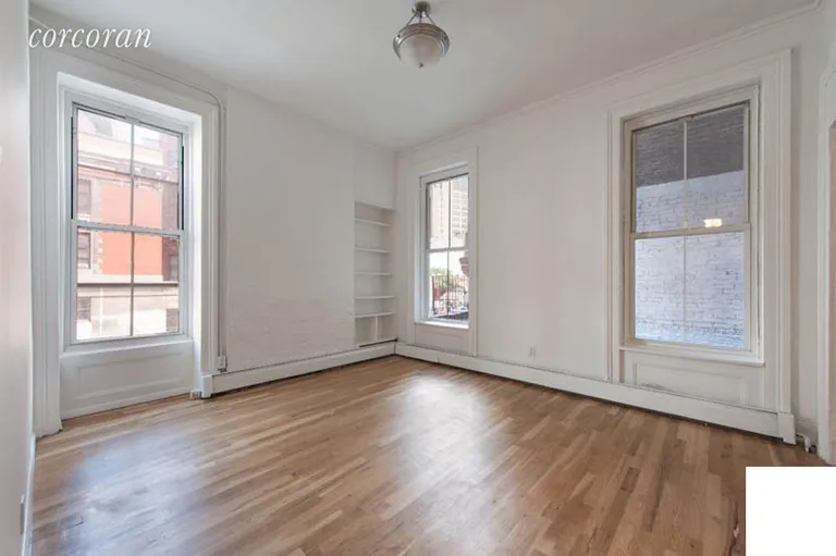 New York City Real Estate | View 11 Varick Street, 2S | Large Living Space features East & South Exposures | View 2