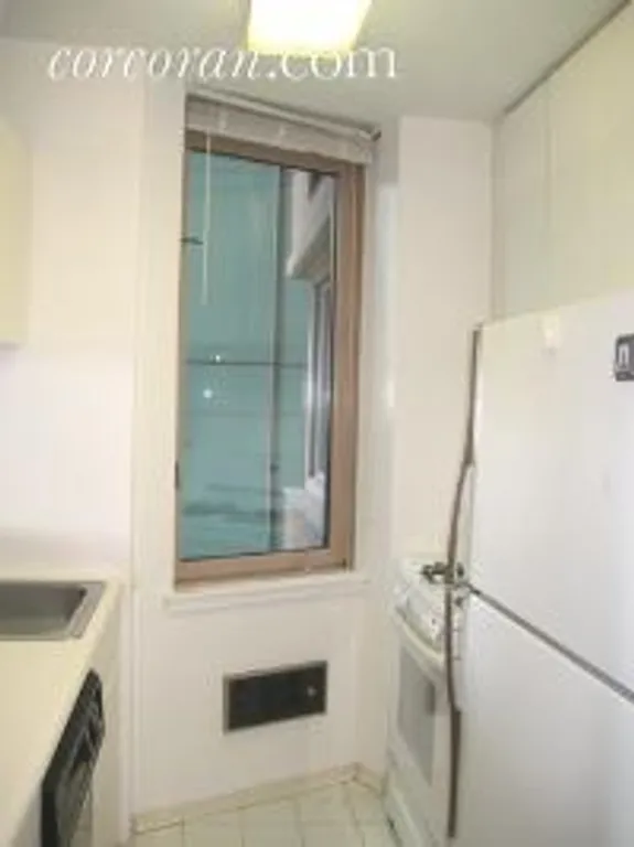 New York City Real Estate | View 235 East 40th Street, 23C | windowed kitchen | View 3
