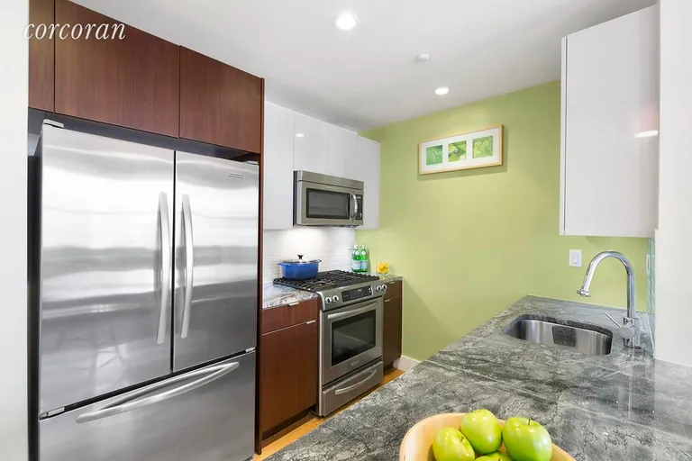 New York City Real Estate | View 105 Baltic Street, C305 | Kitchen w/Custom Cabinets & Stainless Appliances | View 2