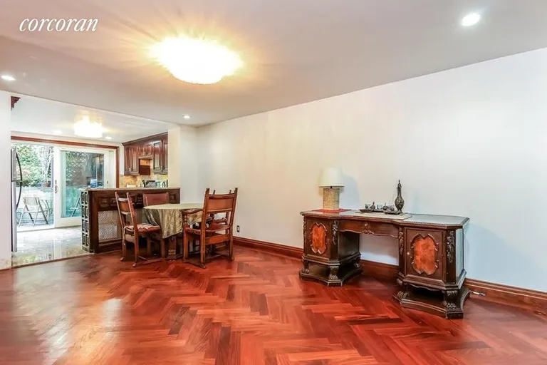 New York City Real Estate | View 111 South Elliott Place, GARDEN | Spacious Living Room with Herringbone Floors | View 2