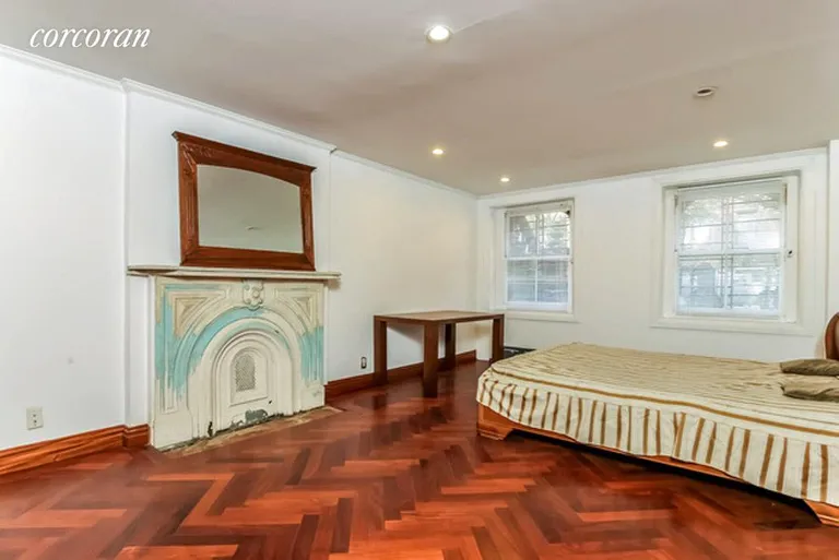 New York City Real Estate | View 111 South Elliott Place, GARDEN | Master Bedroom has Decorative Fireplace | View 8