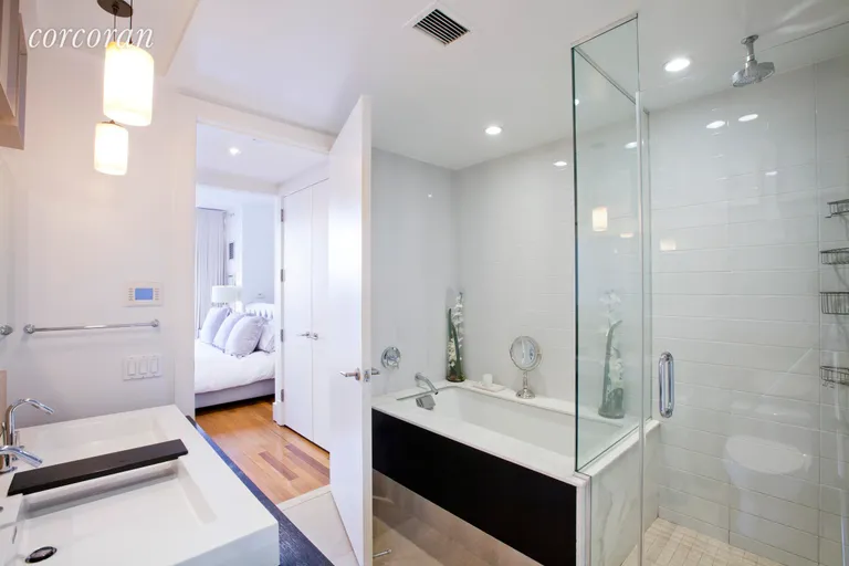 New York City Real Estate | View 165 West 18th Street, 3A | Dual sinks with storage and a deep soaking tub | View 3