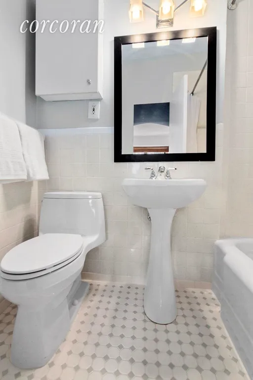 New York City Real Estate | View 305 East 40th Street, 18C | Updated Bathroom | View 6