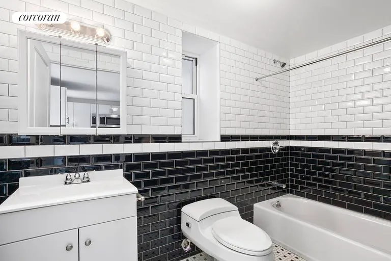 New York City Real Estate | View 69 Maujer Street, 1 FL | Spacious windowed bathroom | View 5