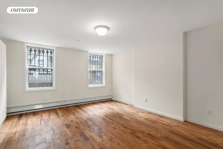 New York City Real Estate | View 69 Maujer Street, 1 FL | Large garden bedroom | View 3