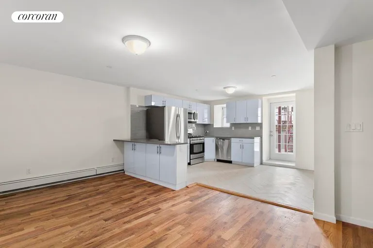New York City Real Estate | View 69 Maujer Street, 1 FL | Open living room and kitchen | View 2