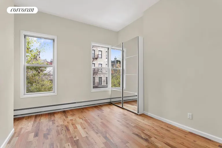 New York City Real Estate | View 69 Maujer Street, 3Fl | Sunny master bedroom with treetop views | View 2