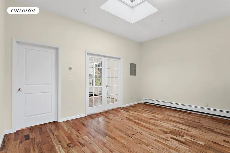 New York City Real Estate | View 69 Maujer Street, 3Fl | Loft-like living room with skylight | View 4