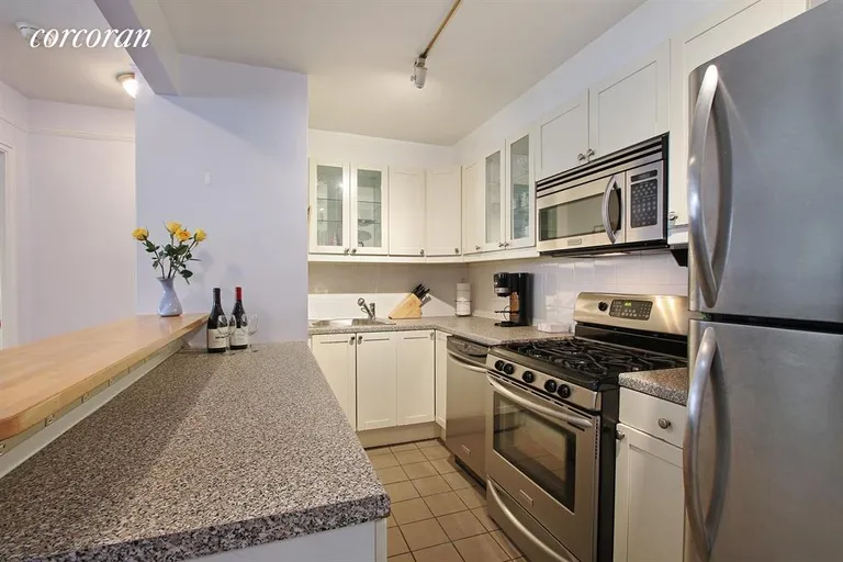 New York City Real Estate | View 301 East 69th Street, 7C | Open Renovated Kitchen | View 2