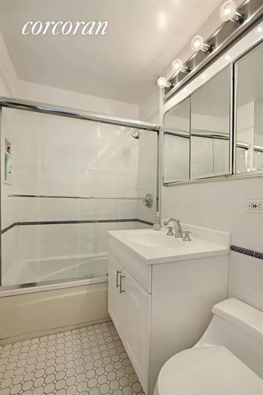 New York City Real Estate | View 301 East 69th Street, 7C | Well Appointed White Bathroom | View 4