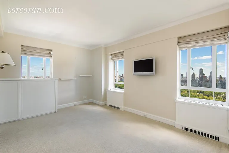 New York City Real Estate | View 25 Central Park West, 28Q | Corner Bedroom with Central Park views  | View 2