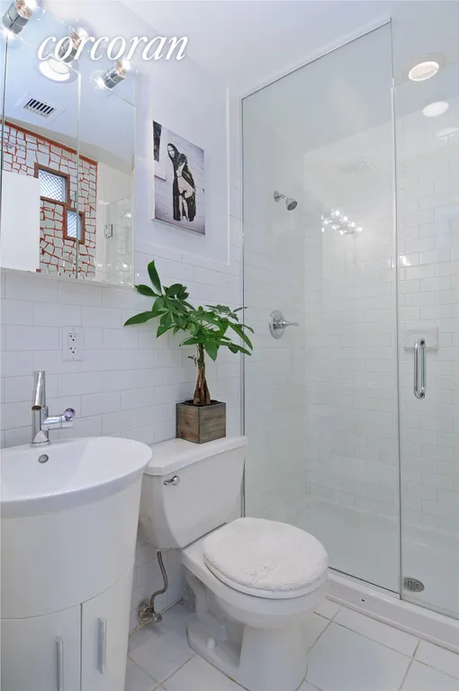 New York City Real Estate | View 240 East Houston Street, 5E | Second Bathroom | View 7