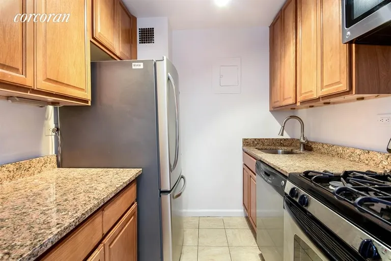 New York City Real Estate | View 301 East 79th Street, 10G |  Kitchen w/ Stainless Appliances  Granite counters | View 2