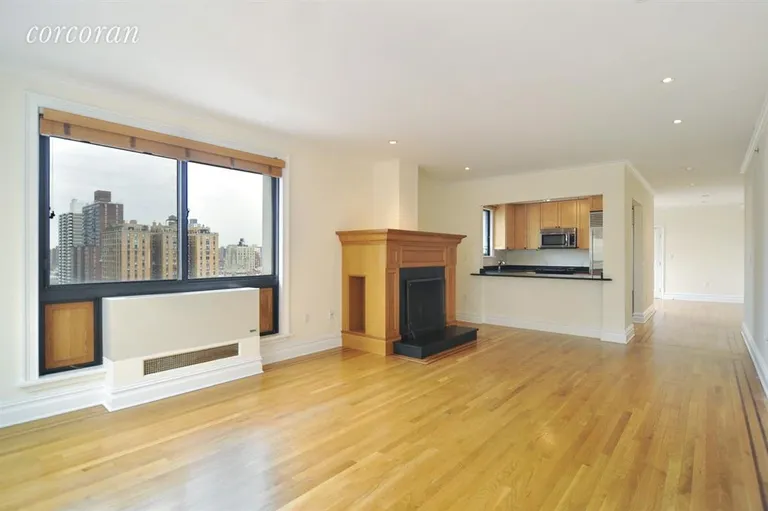 New York City Real Estate | View 203 West 90th Street, PHH | Living Room with fire place and open city views | View 2