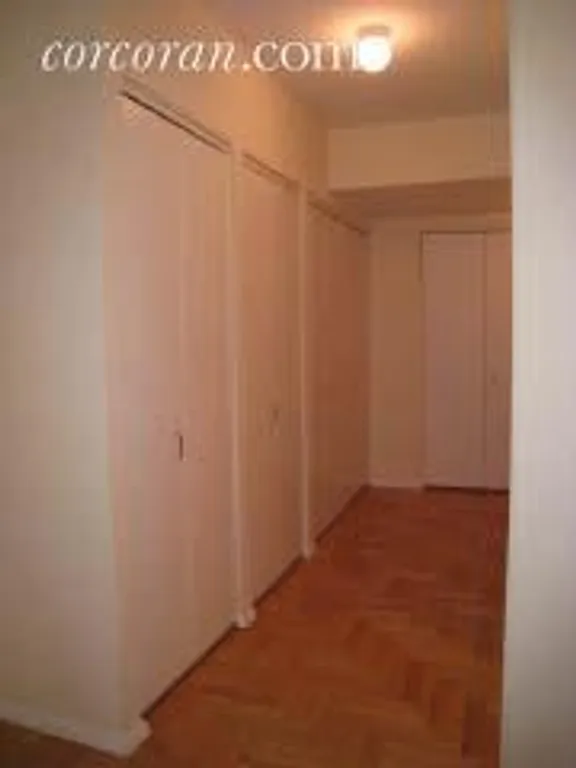 New York City Real Estate | View 170 East 87th Street, E3C | Hallway with 5 closets | View 3