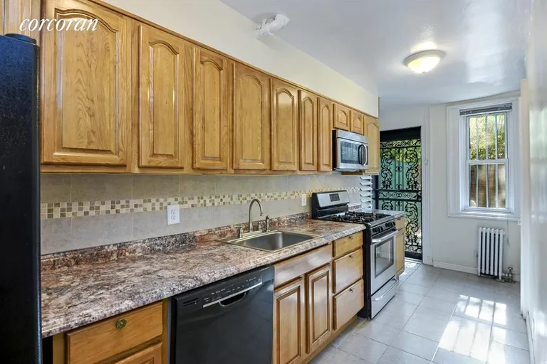 New York City Real Estate | View 136 Amity Street, Garden | Completely Renovated Kitchen | View 3