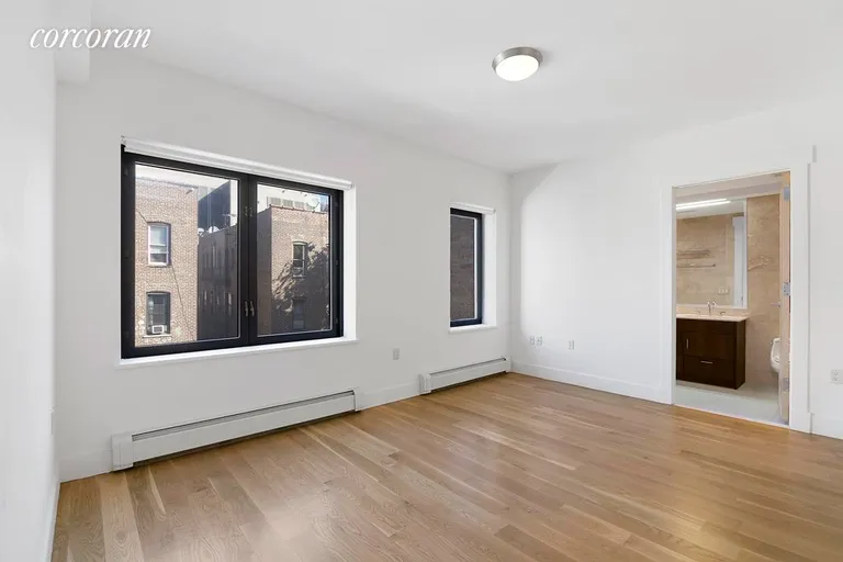 New York City Real Estate | View 47 Dean Street, 5A | Master bedroom with en suite bath | View 5