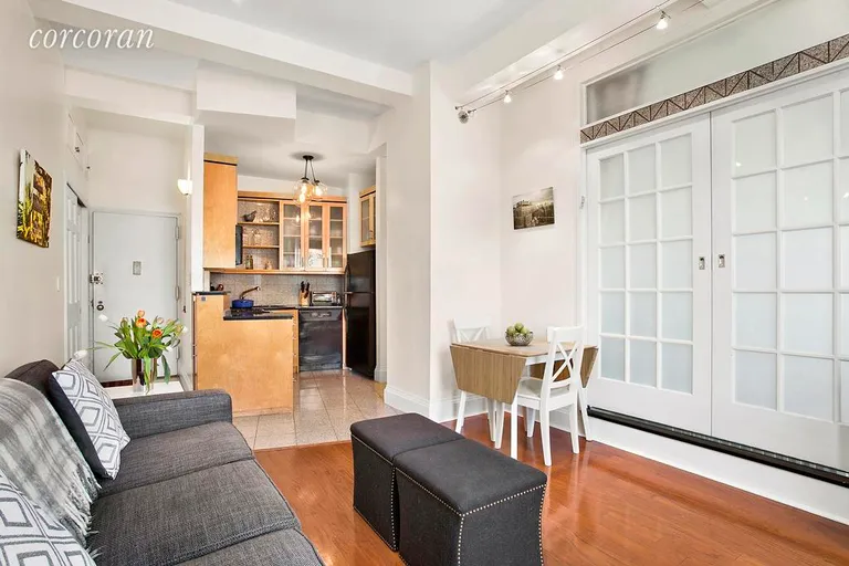 New York City Real Estate | View 150 Joralemon Street, 9C | Kitchen with Custom Cabinets and Lighting | View 2