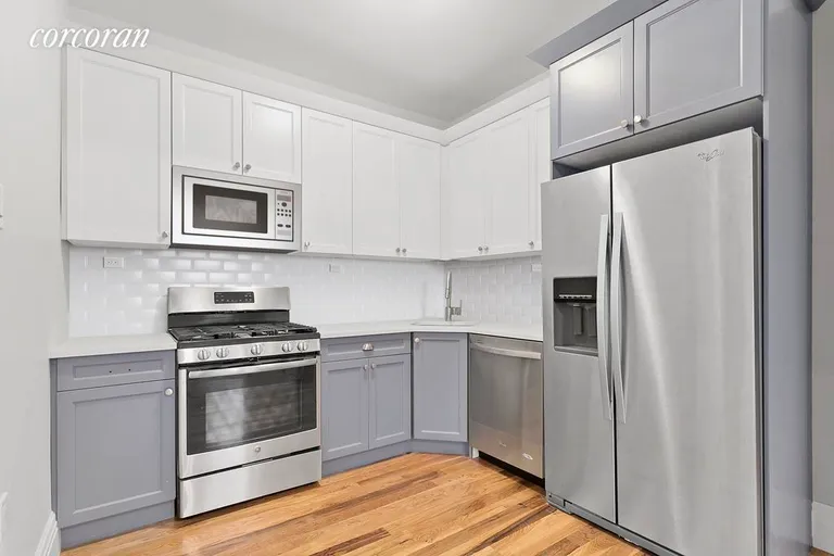 New York City Real Estate | View 1391 Dean Street, 2E | Modern kitchen with stainless steel appliances  | View 5