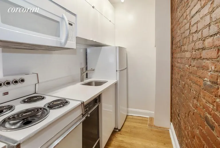 New York City Real Estate | View 327 East 65th Street, 3F | Newly renovated galley kitchen | View 2