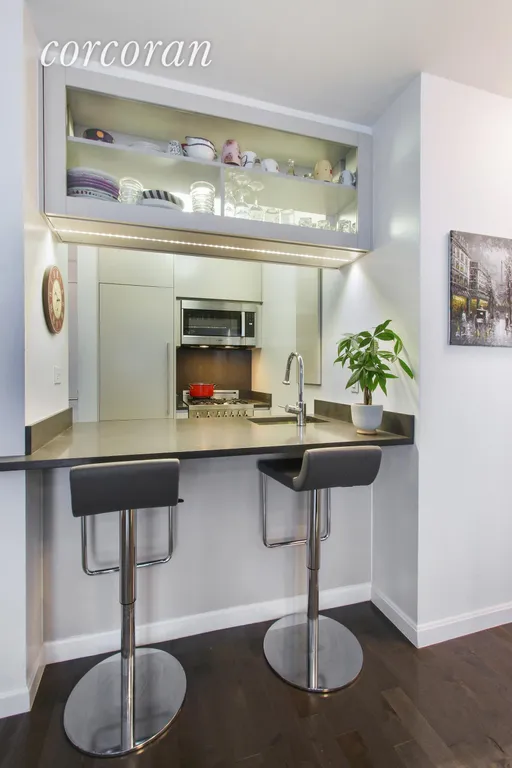 New York City Real Estate | View 45 East 25th Street, 17C | Pristine condition kitchen with modern appliances. | View 2