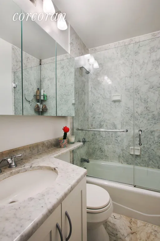 New York City Real Estate | View 45 East 25th Street, 17C | Marble bathroom with glass finishes!   | View 4