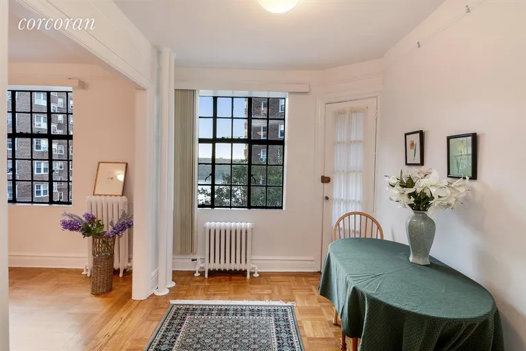 New York City Real Estate | View 116 Pinehurst Avenue, J45 | Dining area with step out fire escape door. | View 4
