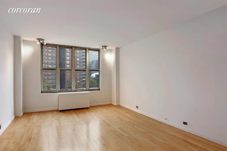New York City Real Estate | View 344 West 23rd Street, 6A | Living Room w/Open Sky Views of Empire State Bldg. | View 2
