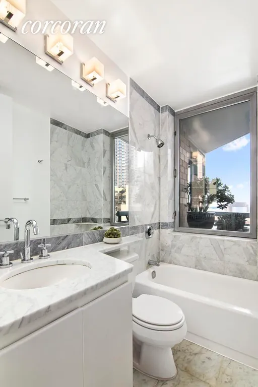 New York City Real Estate | View 500 West 43rd Street, 8K | A shower with a view!  | View 5