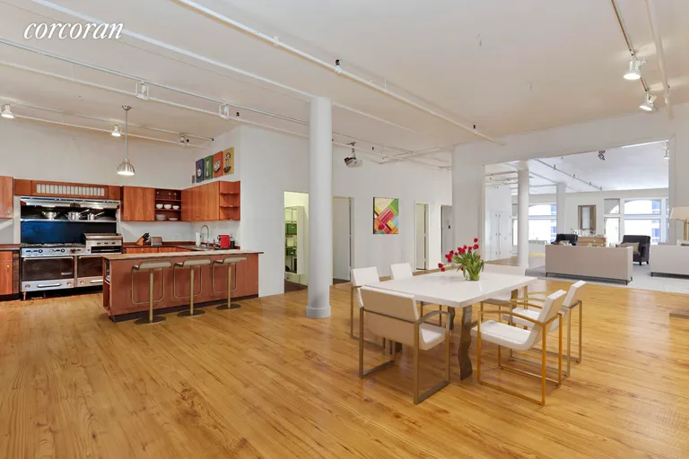 New York City Real Estate | View 31 West 31st Street, 8 | Spacious Dining Room and Open Kitchen | View 2