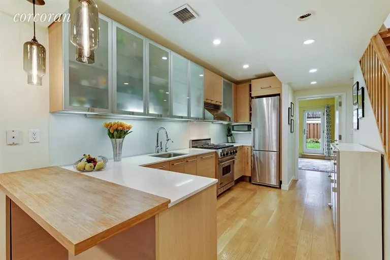 New York City Real Estate | View 401 10th Street, Garden | Chef's Kitchen with Breakfast Bar | View 2
