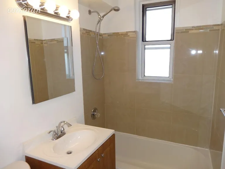 New York City Real Estate | View 2104 Holland Avenue, 5D | Renovated Bathroom | View 8