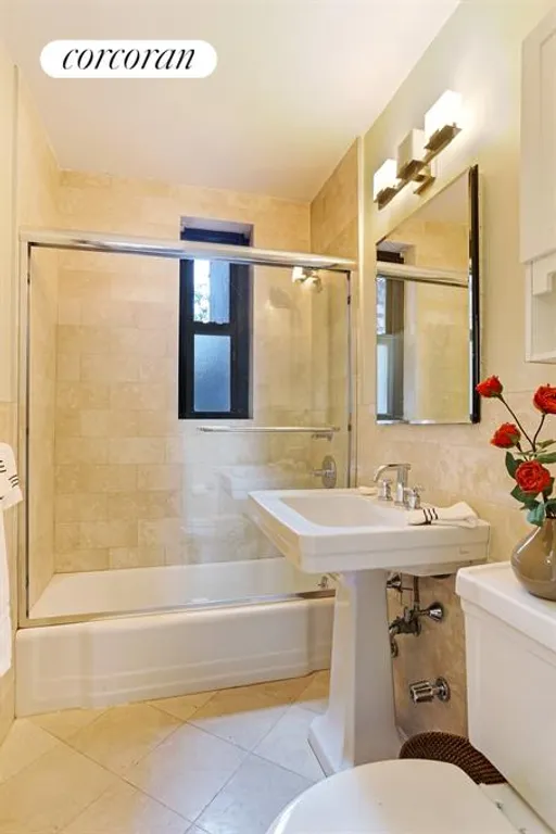 New York City Real Estate | View 100 West 12th Street, 2C | Renovated Windowed Bathroom | View 5