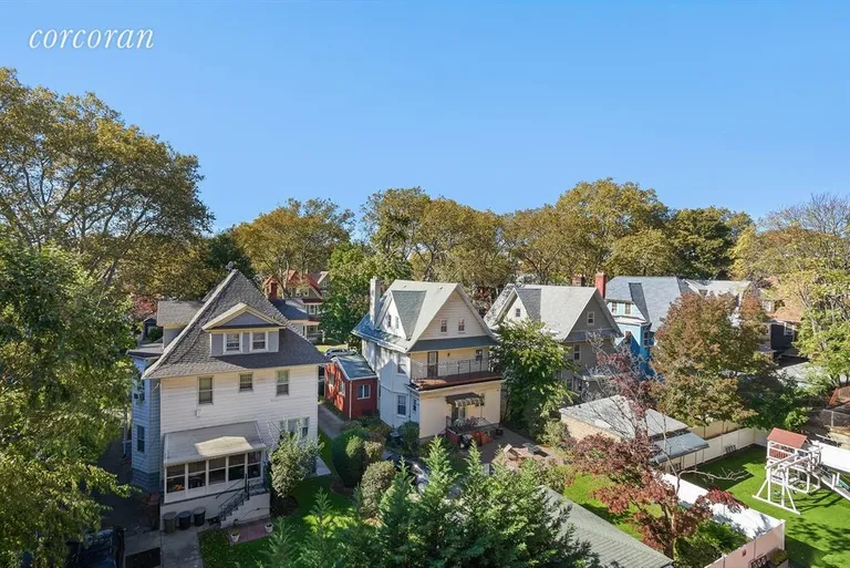 New York City Real Estate | View 1138 Ocean Avenue, 5G | Back garden treetop historic mansion district view | View 7