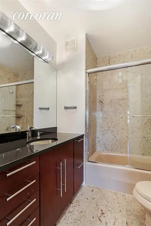 New York City Real Estate | View 240 East 47th Street, 26D | Master Bathroom | View 8