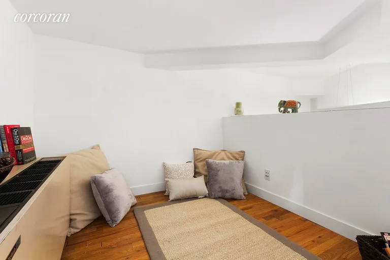 New York City Real Estate | View 77 Bleecker Street, 620 | Lounge/possibly office in loft area  | View 6