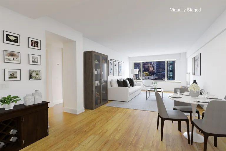 New York City Real Estate | View 211 East 51st Street, 10G | 21 foot living and entertaining space  | View 2