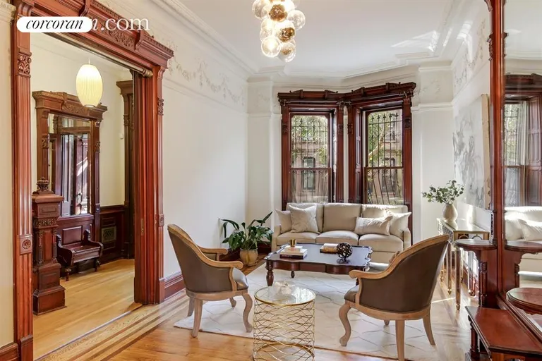 New York City Real Estate | View 131 Lincoln Place | Parlor Living Room with Pier Mirror & Moldings | View 5