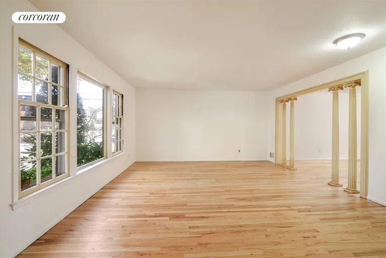 New York City Real Estate | View 116 82nd Street | Spacious Living Room Leading to Formal Dining Room | View 2