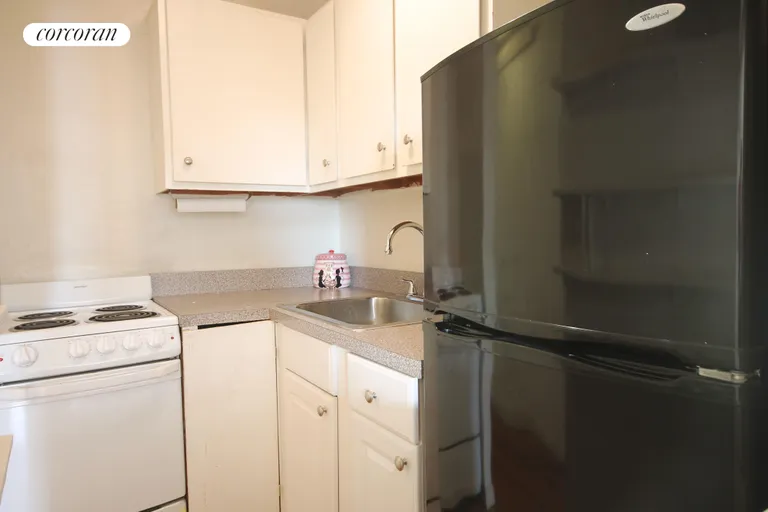 New York City Real Estate | View 36 West 85th Street, 5 | Pass-Thru kitchen, open to Living room | View 5
