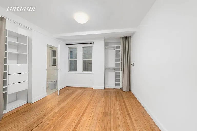 New York City Real Estate | View 321 East 43rd Street, 505-506 | Master bedroom with en suite bathroom | View 8