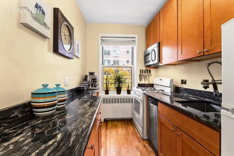 New York City Real Estate | View 300 West 53rd Street, 3F | Gut renovated kitchen with luxurious finishes | View 3